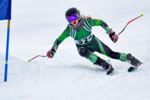 skiing racer rounding a turn